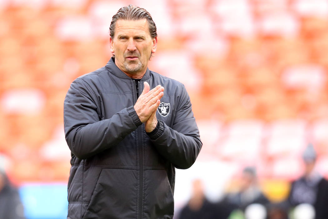 Oakland Raiders offensive coordinator Greg Olson rubs his hands together prior to an NFL game a ...