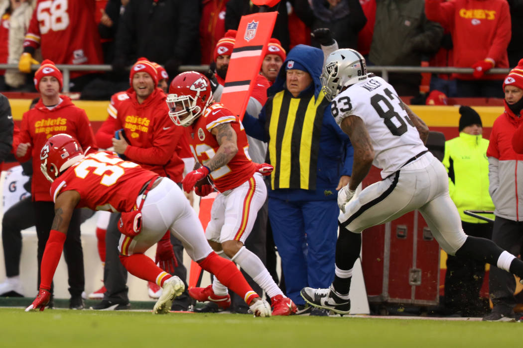 Kansas City Chiefs strong safety Tyrann Mathieu (32) follows cornerback Charvarius Ward (35) do ...