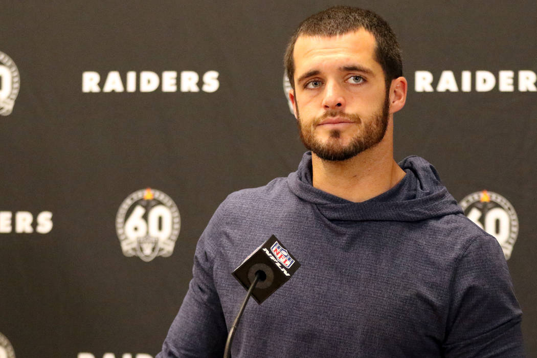 Oakland Raiders quarterback Derek Carr meets with the media after an NFL game against the Kansa ...