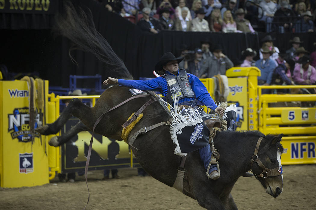 Rusty Wright makes his run during National Finals Rodeo on Monday, Dec. 10, 2018, at Thomas &am ...