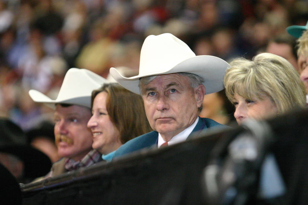 Shawn Davis takes in a go-round of the Wrangler National Finals Rodeo at the Thomas & Mack Cent ...