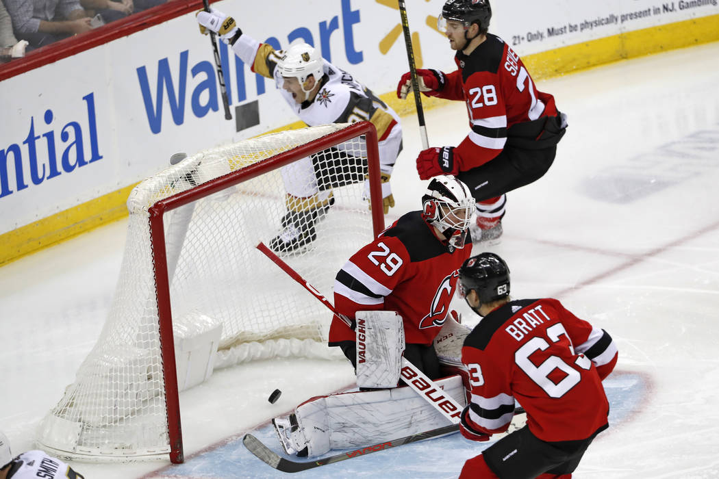 Vegas Golden Knights center Jonathan Marchessault (81)] reacts as his shot slips behind New Jer ...