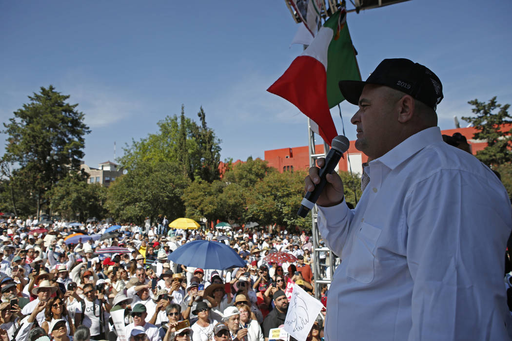 Julian LeBaron speaks during a protest against the first year in office of Mexico's President A ...