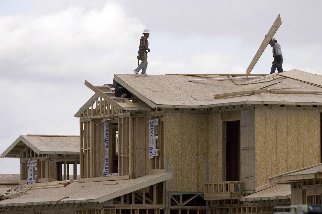 Construction workers build a home in Las Vegas. (Las Vegas Review-Journal file photo)