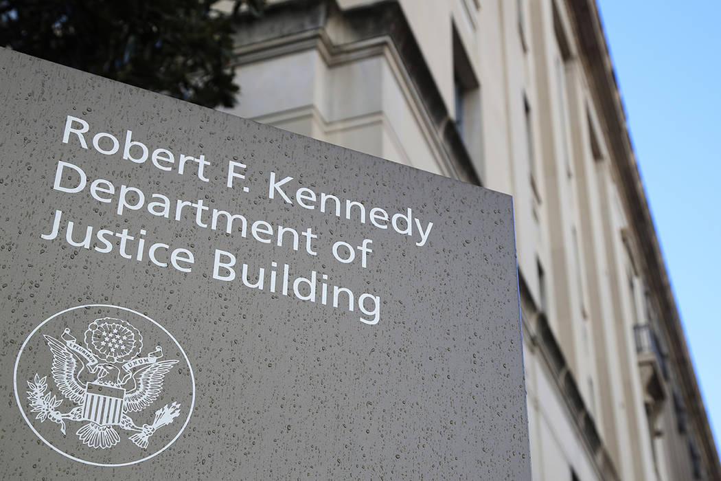 This Friday, March 22, 2019, file photo shows the Department of Justice Building in Washington. ...