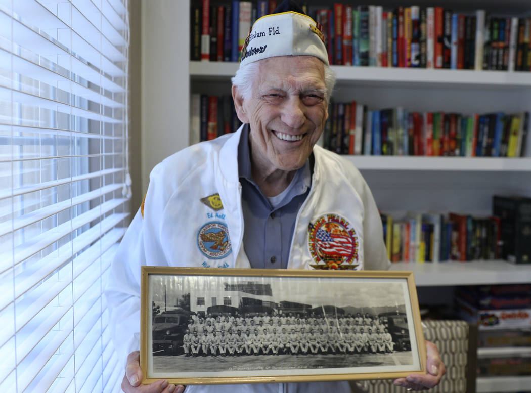 U.S. Army Air Corps veteran Edward Hall, a 95-year-old survivor of Pearl Harbor, poses for a ph ...