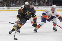 Golden Knights center William Karlsson (71) moves toward the New York Islanders goal with the p ...