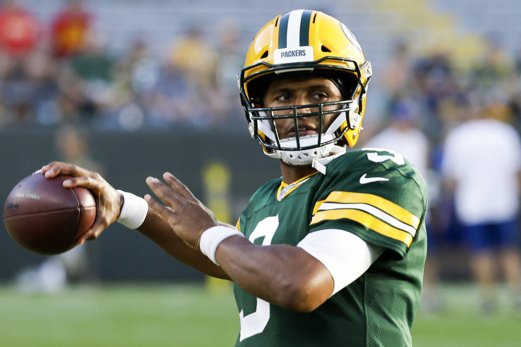 Green Bay Packers' DeShone Kizer warms up before a preseason NFL football game against the Kans ...