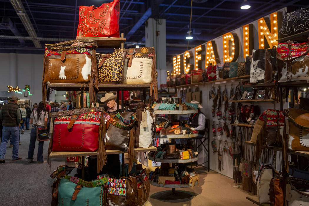 Handmade leather handbags and accessories for sale at McFadin Leather Goods booth at Cowboy Chr ...