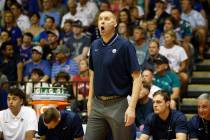 BYU head coach Mark Pope reacts to play as his team takes on Kansas during the first half of an ...