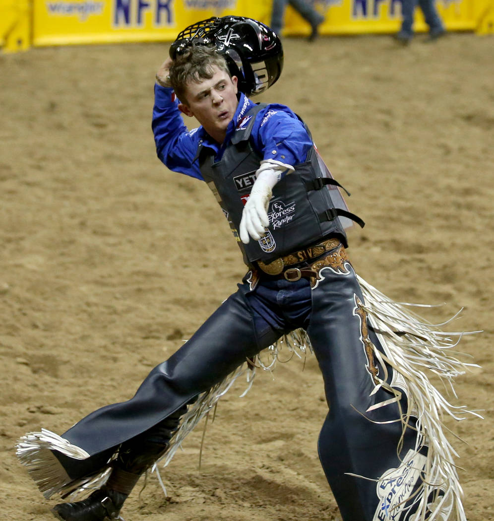 Bull rider Stetson Wright of Milford, Utah, celebrates his 92.5 ride on Monte Walsh which won t ...