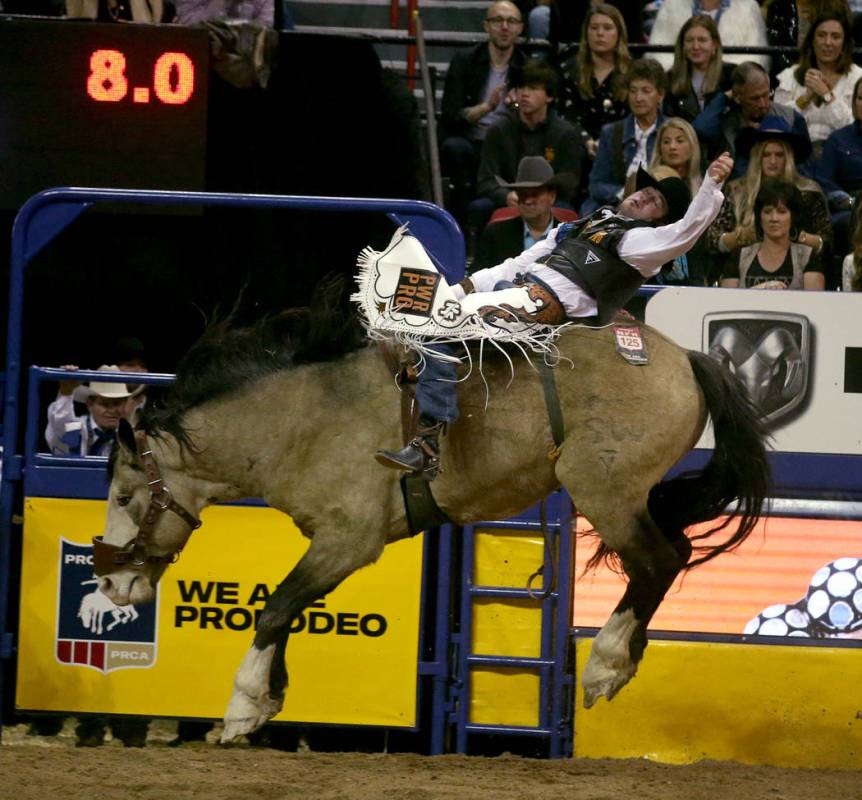 Kaycee Feild of Genola, Utah rides Colorado Bulldog to a score of 87 in the Bareback Riding com ...