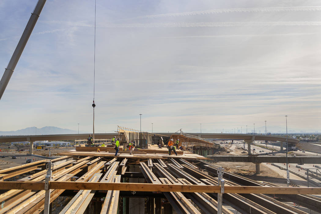 Construction continues on the Centennial Bridge connecting U.S. Highway 95 northbound to the 21 ...