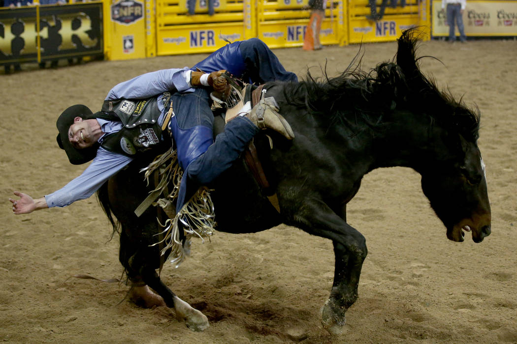 Trenton Montero of Winnemucca rides Prairie Rose in Bareback Riding during the second go-around ...