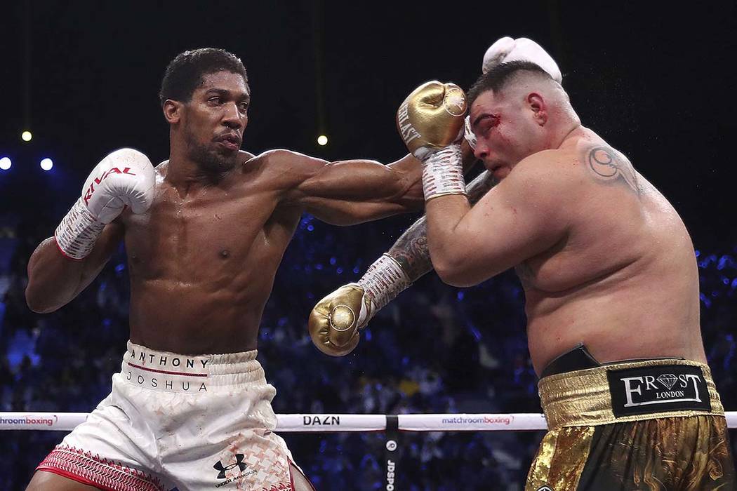 Defending champion Andy Ruiz Jr., right, during his fight against Britain's Anthony Joshua in t ...