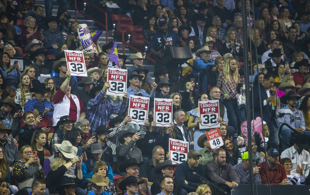 Fans support their favorite competitors during the third go-around of the Wrangler National Fin ...