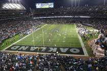 An overview of the Oakland-Alameda County Coliseum before the start of an NFL game between the ...