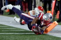 New England Patriots wide receiver N'Keal Harry dives for the pylon after catching a pass again ...