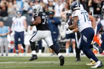 Oakland Raiders defensive tackle Maurice Hurst (73) runs after intercepting a pass against the ...