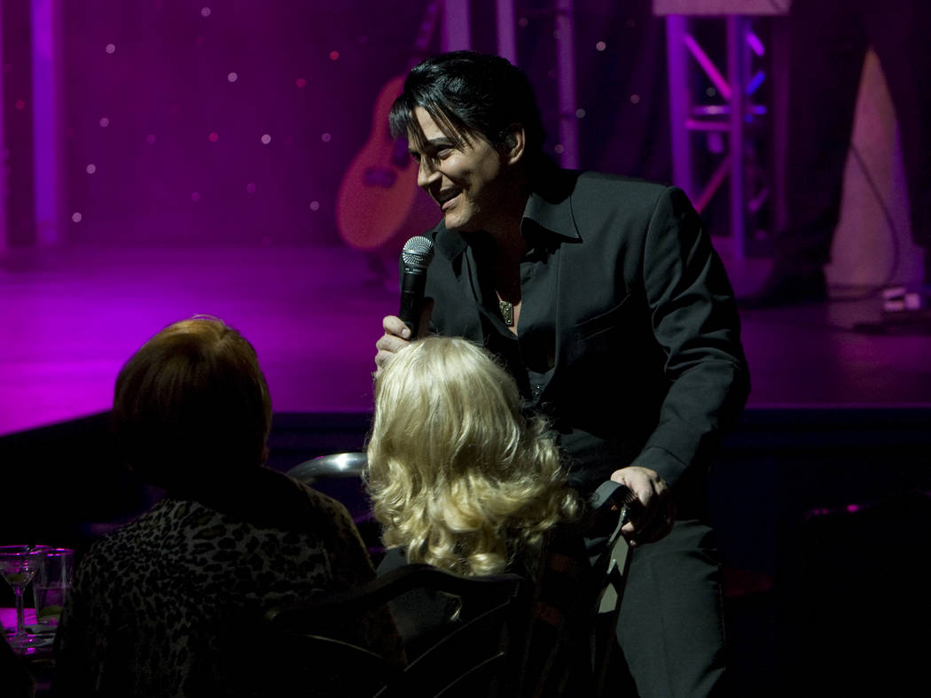 Elvis Presley tribute artist Trent Carlini performs in his "The King" show in the Shimmer Cabar ...