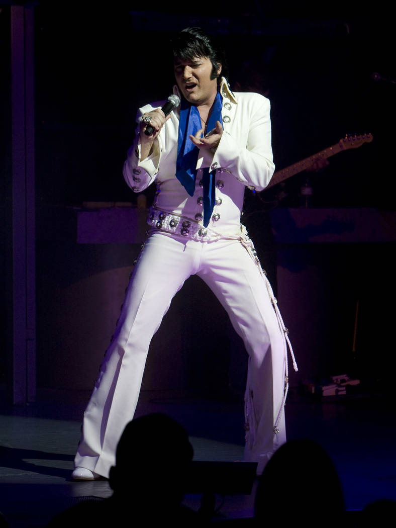 Elvis Presley tribute artist Trent Carlini performs in his "The King" show in the Shimmer Cabar ...