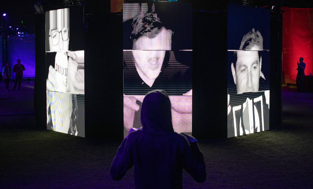 Luke Yeager, 15, of Las Vegas, views the "I Am Therefore I Am" art installation at In ...