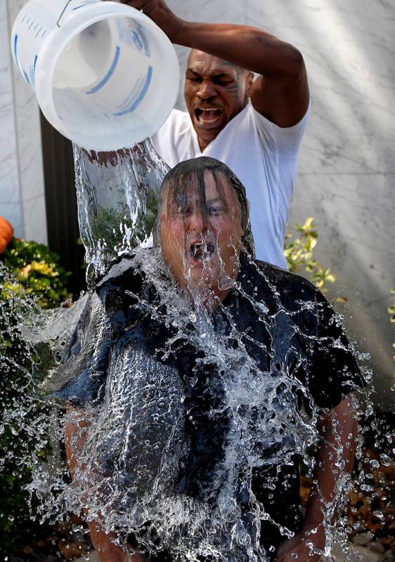 Mike Tyson dumps ice water on Las Vegas attorney David Chesnoff outside of Chesnoff's law firm ...