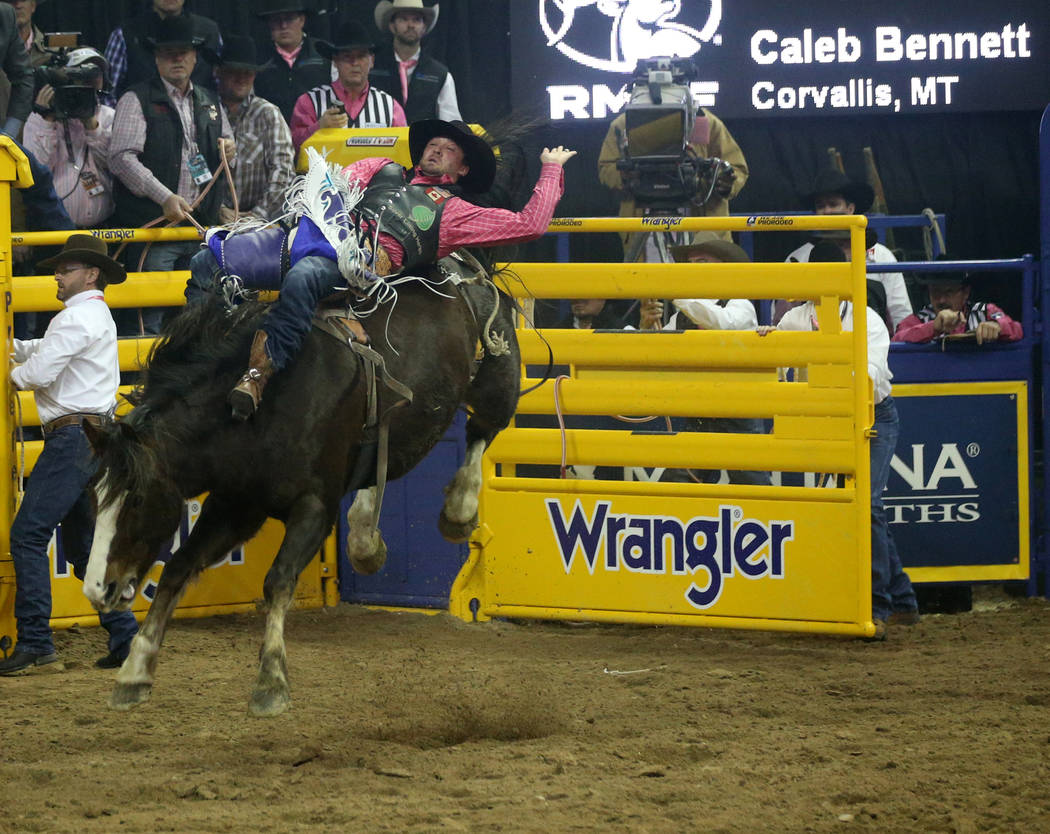 Caleb Bennett of Corvallis, Mont. rides Stevie Knicks during Bareback Riding in the fifth go-ar ...