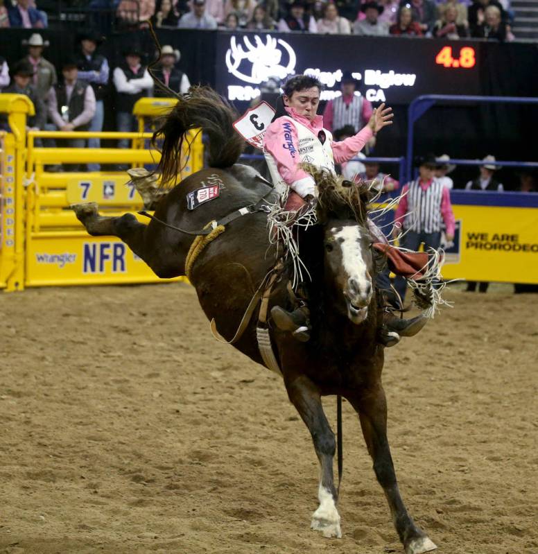 Clayton Biglow rides Scarlett Belle during Bareback Riding in the fifth go-around of the Wrangl ...