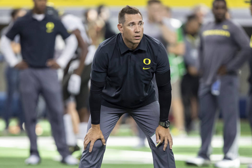 Oregon Ducks Assistant Head Coach Marcus Arroyo looks on during the AdvoCare Classic college fo ...