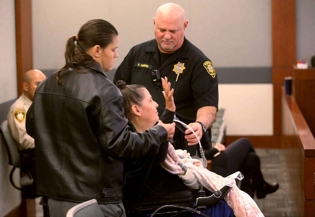 Barbara Owens is sworn in at the Regional Justice Center in Las Vegas Wednesday, Dec. 11, 2019, ...