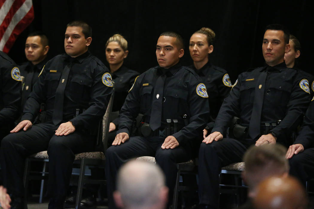 Police academy recruits during their Henderson Police Department's first police academy graduat ...