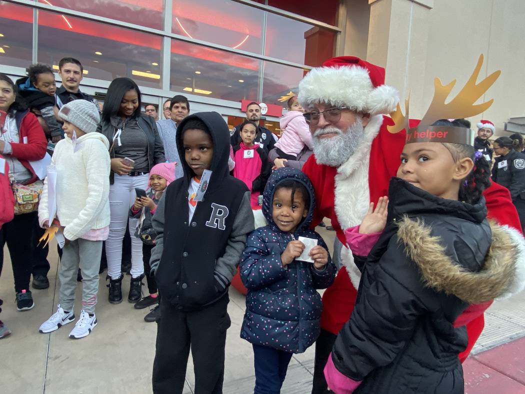 Santa gave a special greeting to more than 40 kids participating in North Las Vegas police's Sh ...