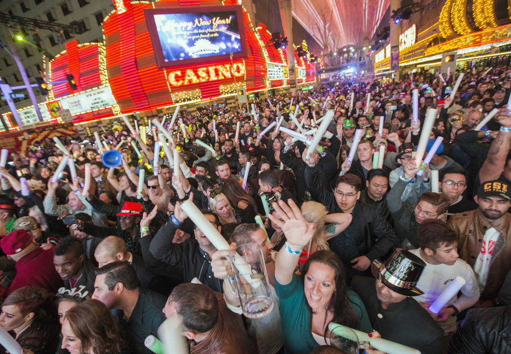 Revelers count down he new year during America's Party on Fremont Street on Saturday, December ...
