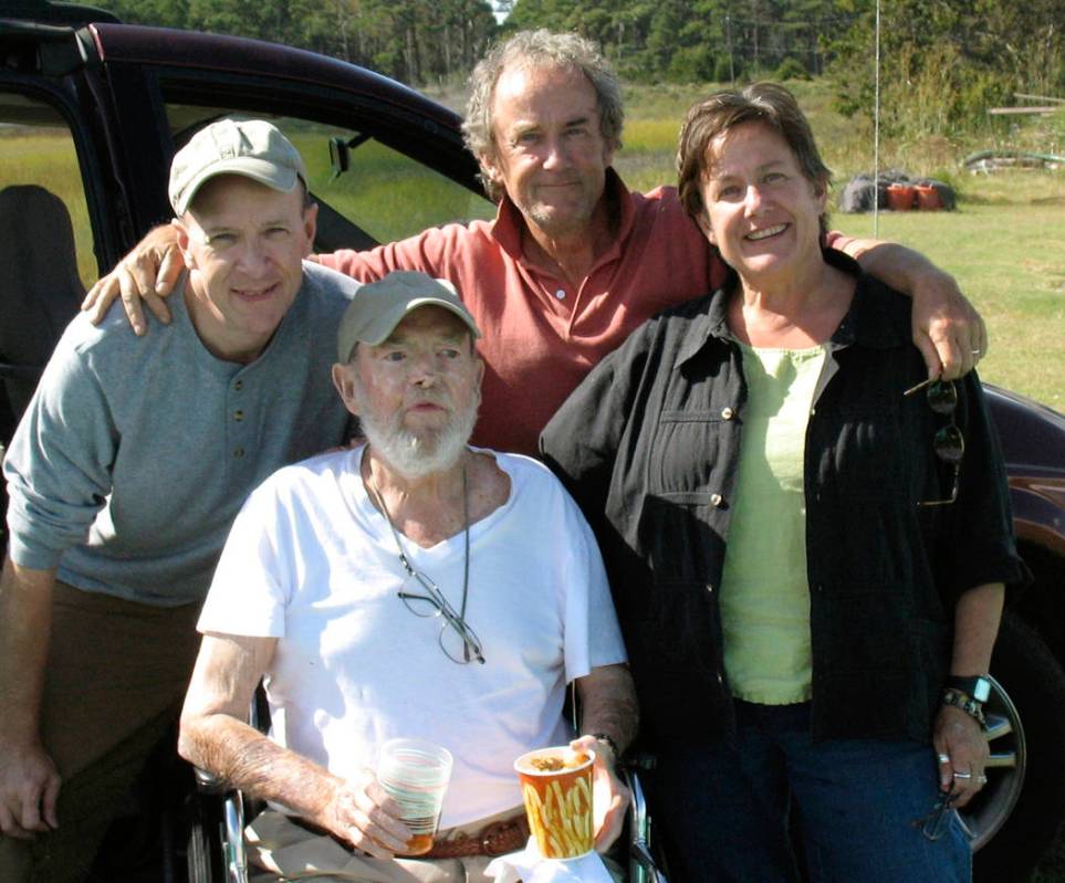 In this Sept. 29, 2009 photo provided by Betsy McNair, Robert McNair, center, poses with his ch ...