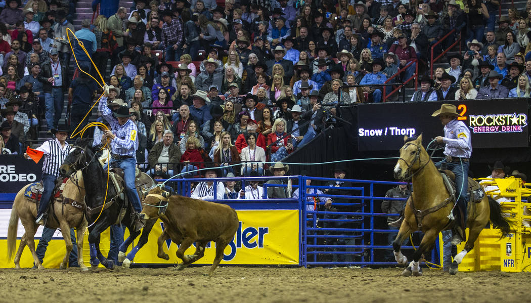 Heeler Wesley Thorp, left, of Throckmorton, Texas, and Header Cody Snow of Los Olivos, Calif., ...