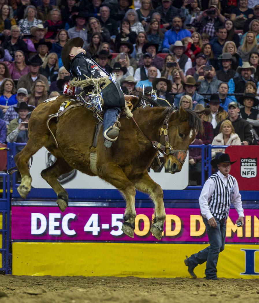 Zeke Thurston of Big Valley, Alberta, leans way back while atop of Get Smart for a first place ...