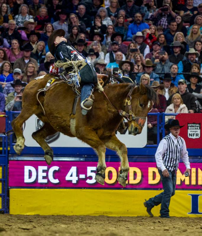 Zeke Thurston of Big Valley, Alberta, leans way back while atop of Get Smart for a first place ...