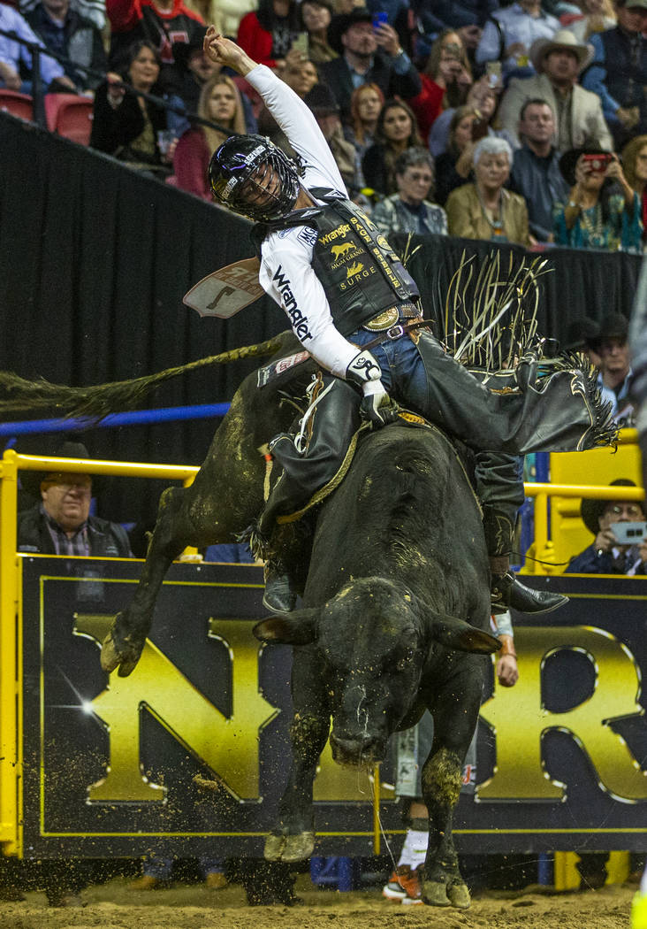 Sage Kimzey of Strong City, Okla., sits tall atop of Smoke Wagon for a first place score of 90 ...