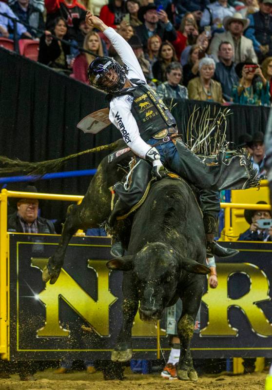 Sage Kimzey of Strong City, Okla., sits tall atop of Smoke Wagon for a first place score of 90 ...