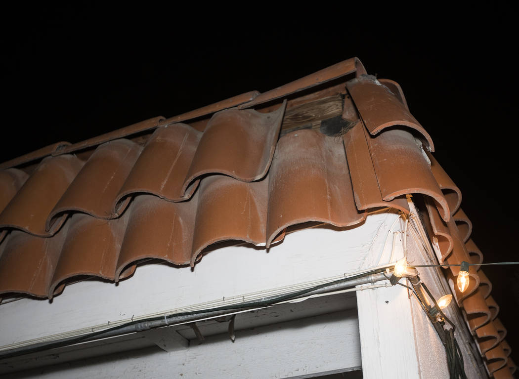 John and Mary Bodimer say tiles have fallen from the roof of their rental home in Las Vega ...