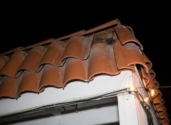 John and Mary Bodimer say tiles have fallen from the roof of their rental home in Las Vega ...