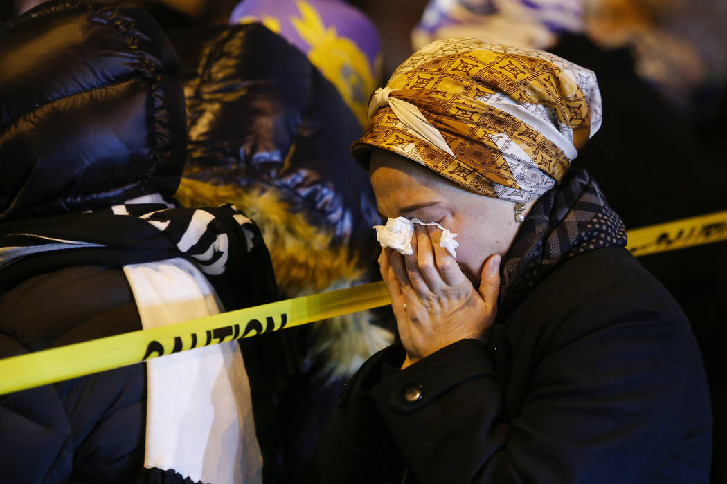 Orthodox Jewish women mourn during the funeral service of Mindel Ferencz who was killed in a ko ...