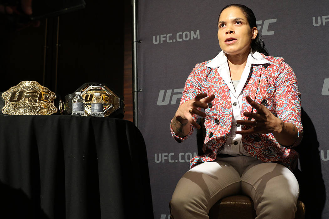 UFC women's featherweight and bantamweight champion Amanda Nunes speaks to reporters during a U ...