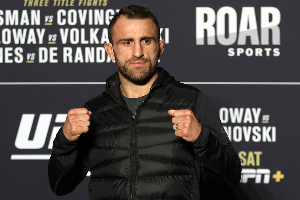 UFC featherweight Alexander Volkanovski poses for a photo during a UFC 245 media event at the R ...