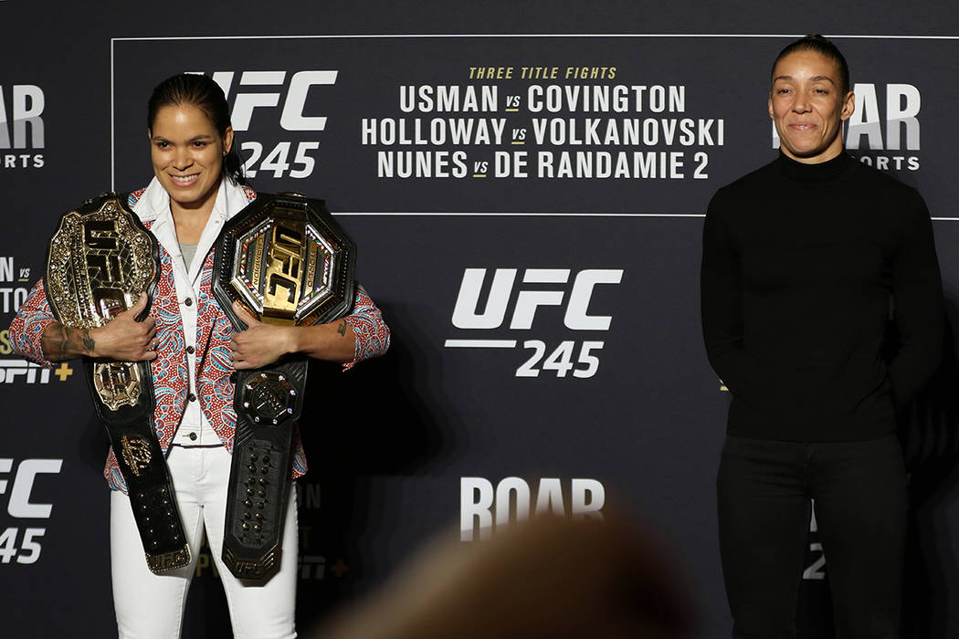 UFC women's two-division champion Amanda Nunes faces off with Germaine de Randamie during a UFC ...