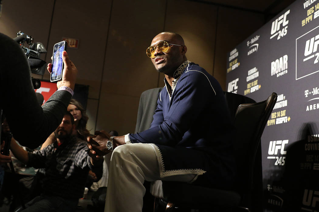 UFC middleweight champion Kamaru Usman speaks to reporters during a UFC 245 media event at the ...