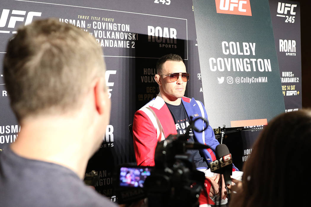 UFC welterweight Colby Covington takes questions from reporters during a UFC 245 media event at ...