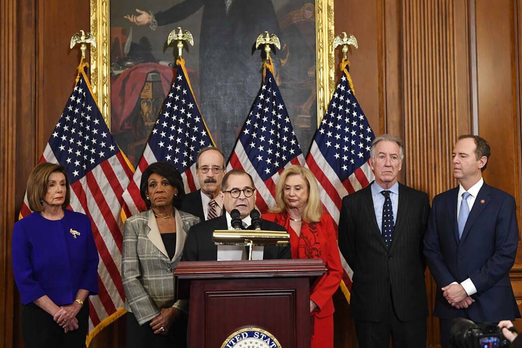 From left House Speaker Nancy Pelosi, Chairwoman of the House Financial Services Committee Maxi ...