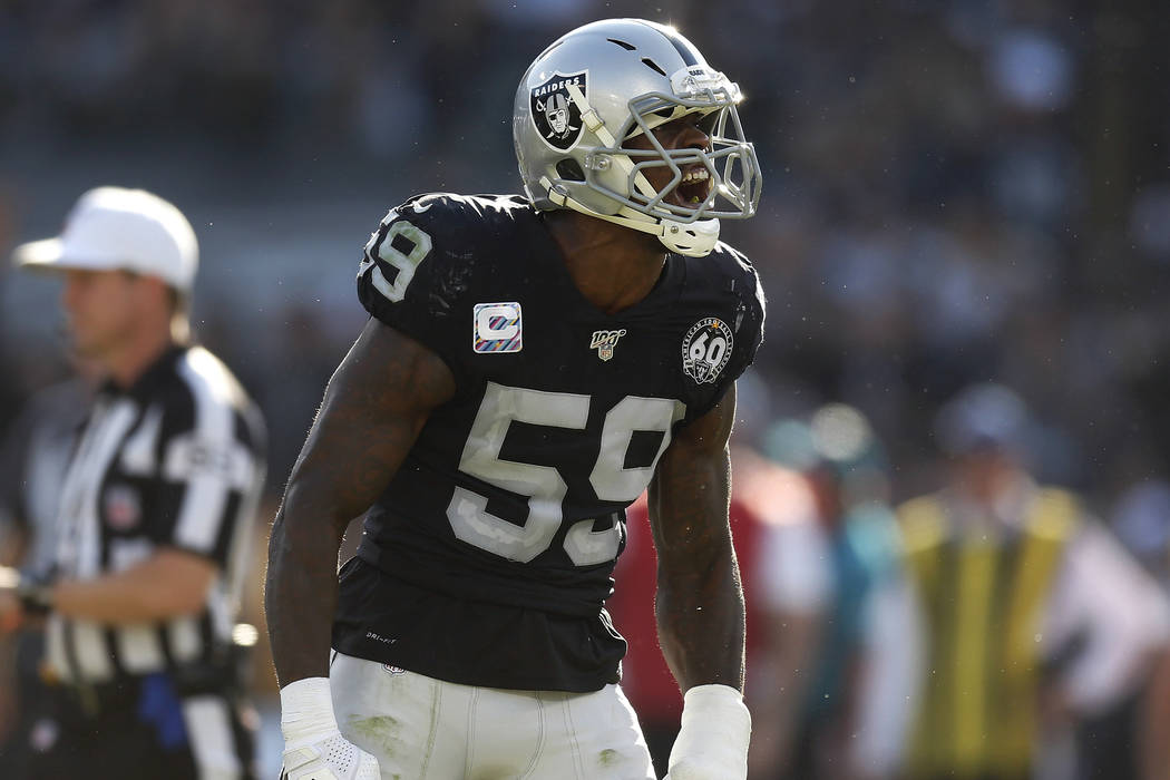 Oakland Raiders outside linebacker Tahir Whitehead (59) reacts after tackling Detroit Lions run ...